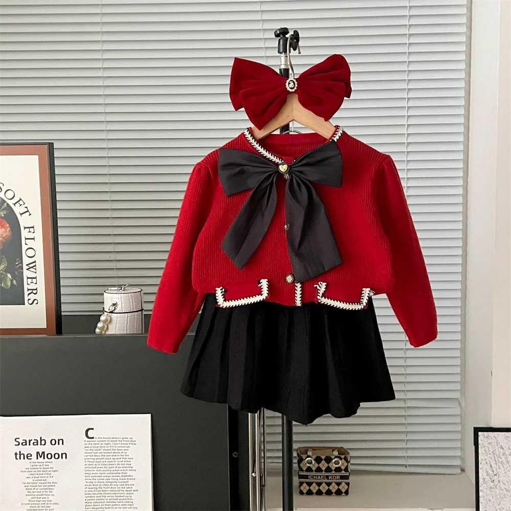 Autumn and Winter Girls Sweater Sets Campus Big Bow Knot Knitted Bubble Sleeve Cardigan Sweaterversatile Pleated Skirt 2pcs Y251105