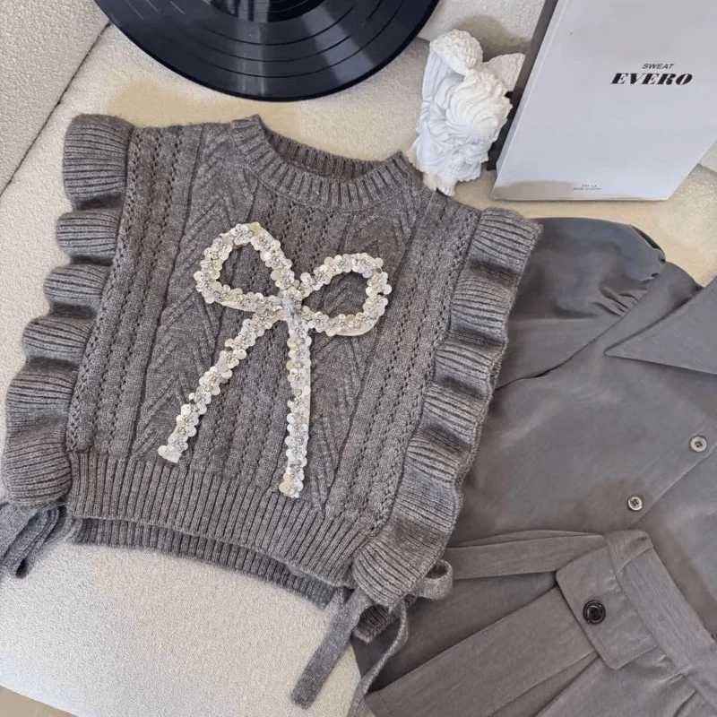 2025Girls Spring and Autumn New Western Style Knitted Vest Shirt Pleated Skirt College Style Three-Piece Set Y251105