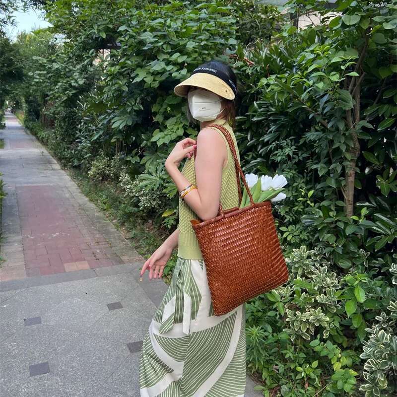 Japanese top layer cowhide hand retro leather woven bucket Single shoulder vegetable basket bag female