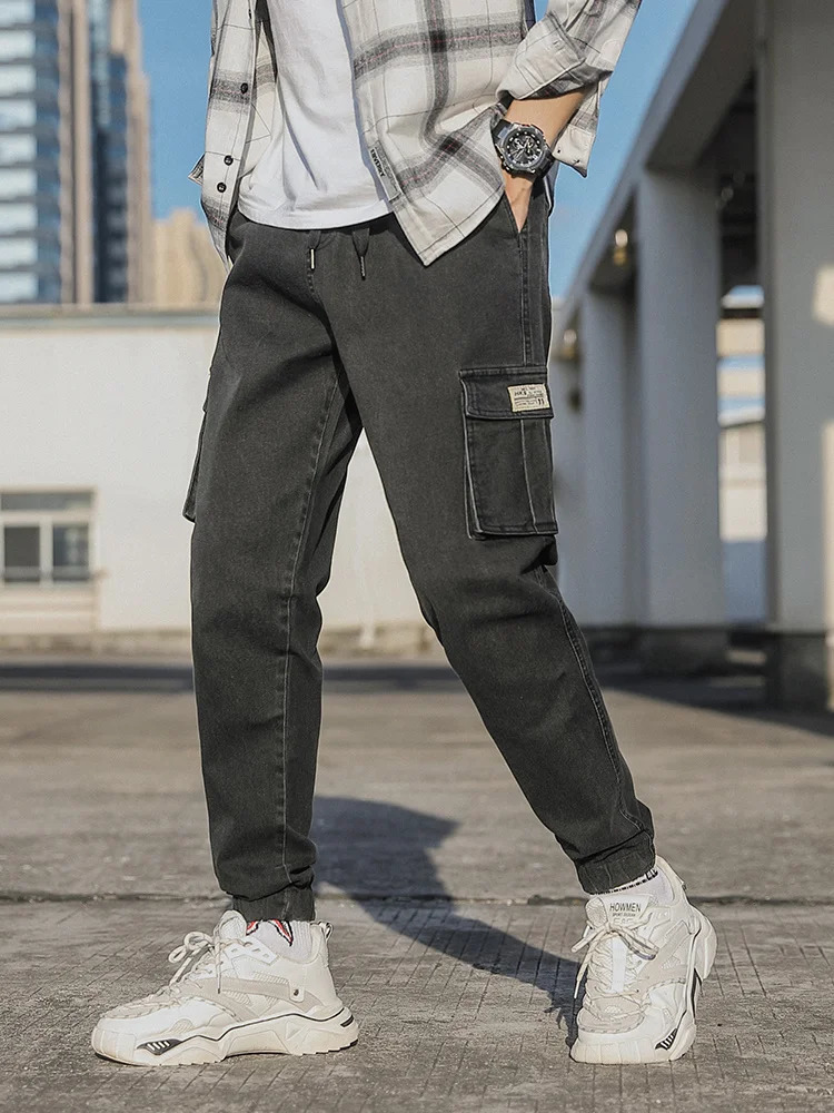 Spring and Autumn Mens Jeans Multi Pocket Work Clothes Cargo Pants Black and Blue Elastic Waist Denim Jogger Large Size Jeans Trousers 8XL 250402