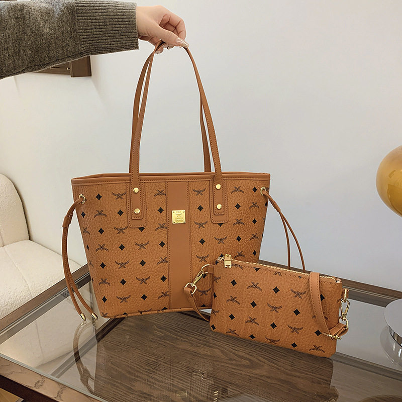 The new fashion senior sense of temperament printed color women bag hand bill shoulder crossbody Tote bag 2025s hot