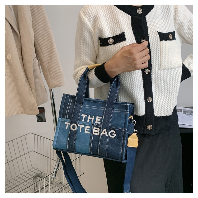 Designer's new embroidered letter handbag women's denim blue retro patch armpit bag