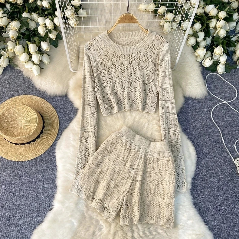 Spring and summer two-piece solid color knitted suit womens round neck hollow short shirthigh waisted short shirt set 250401