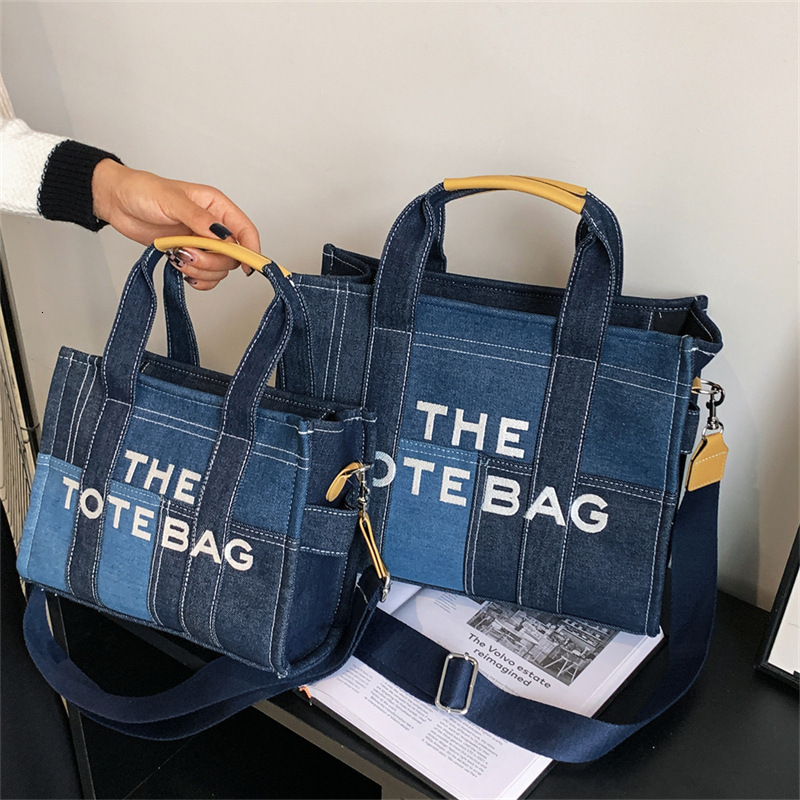 Designer's new embroidered letter handbag women's denim blue retro patch armpit bag