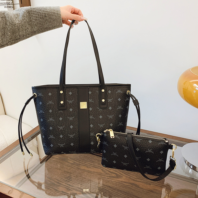 The new fashion senior sense of temperament printed color women bag hand bill shoulder crossbody Tote bag 2025s hot