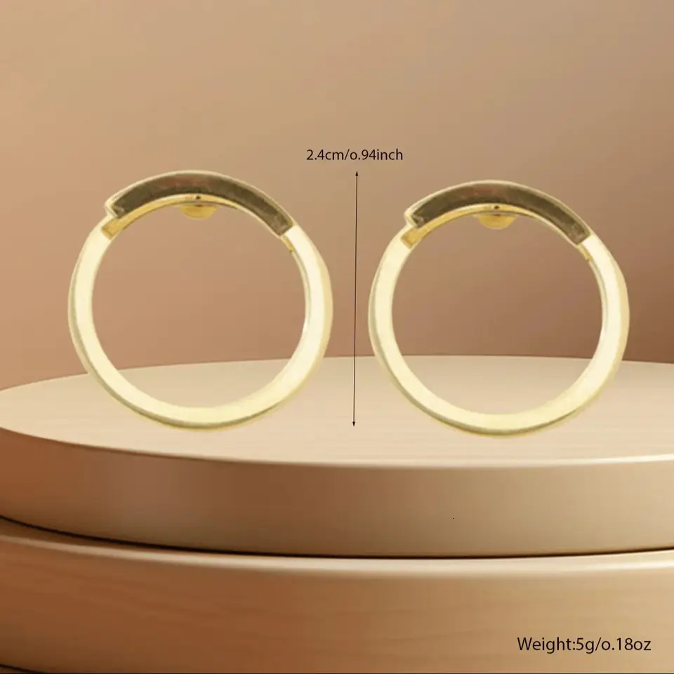 There is a pair of retro geometric circular earrings on the back suitable for womens fashion and personalized n A outfits elegan 250326