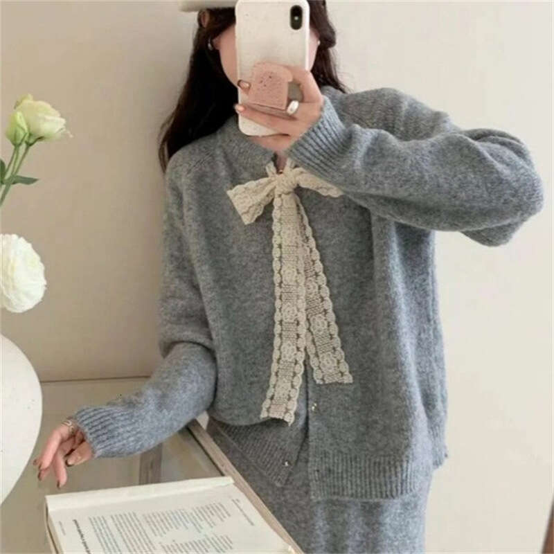 Gentle Temperament for Women, Autumn and Winter 2025 New Lace-Up Sweater A-Line Knitted Skirt Solid Color Two-Piece Set