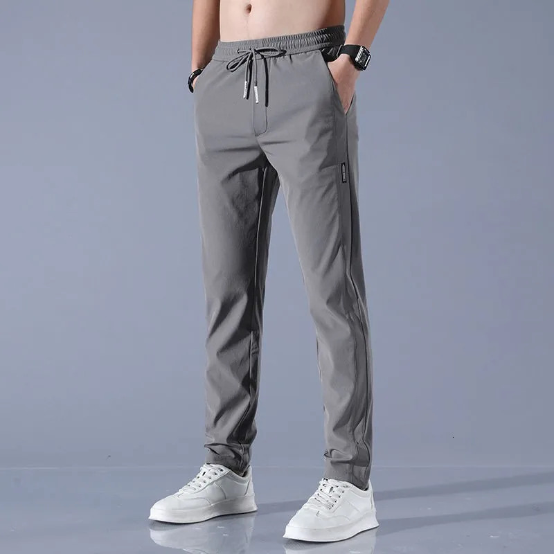 2025 summer slim Korean version plus size trendy straight tube light business ice silk casual pants for men slim fit pants 251104