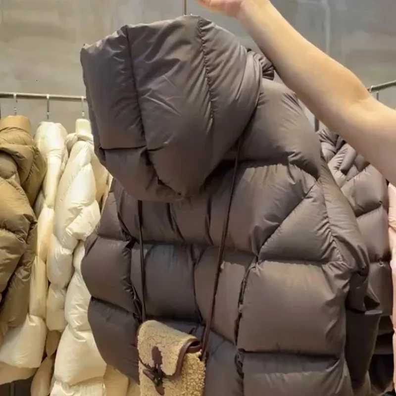 Fashion Women Down Jackets 2025 New Female Stand Collar Puffer Jacket Casual Loose Hooded ParkasT251105