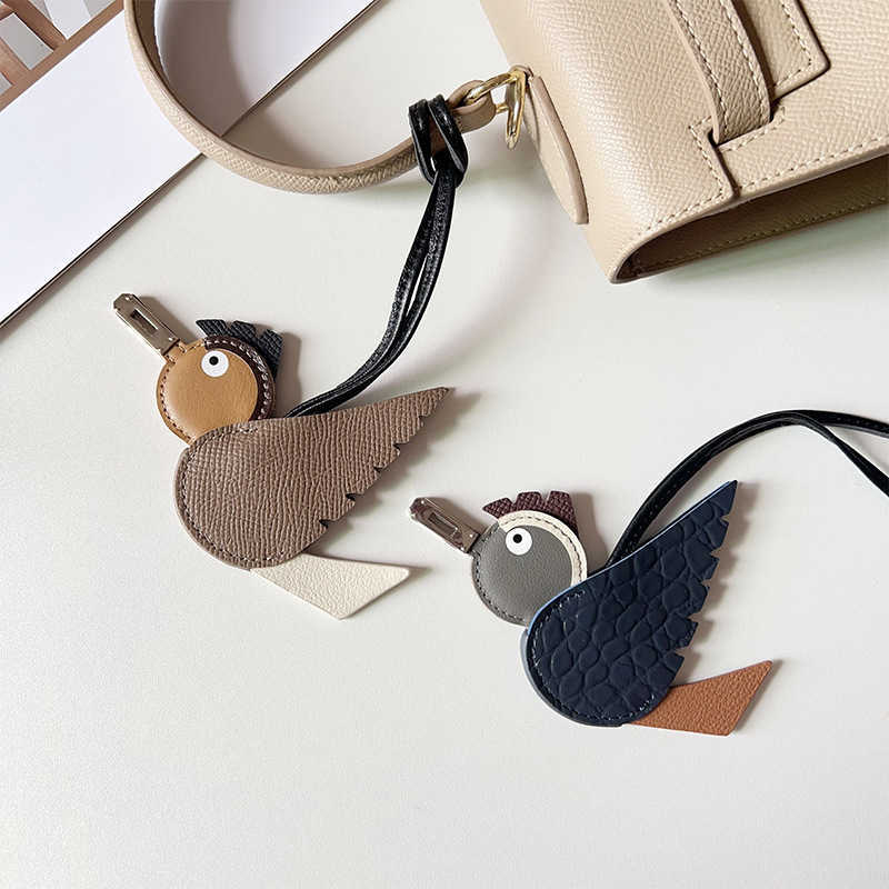 Keychains Lanyards Small bird pendant bag niche decoration cowhide pendant new cartoon small bird keychain accessories car pendant H25403