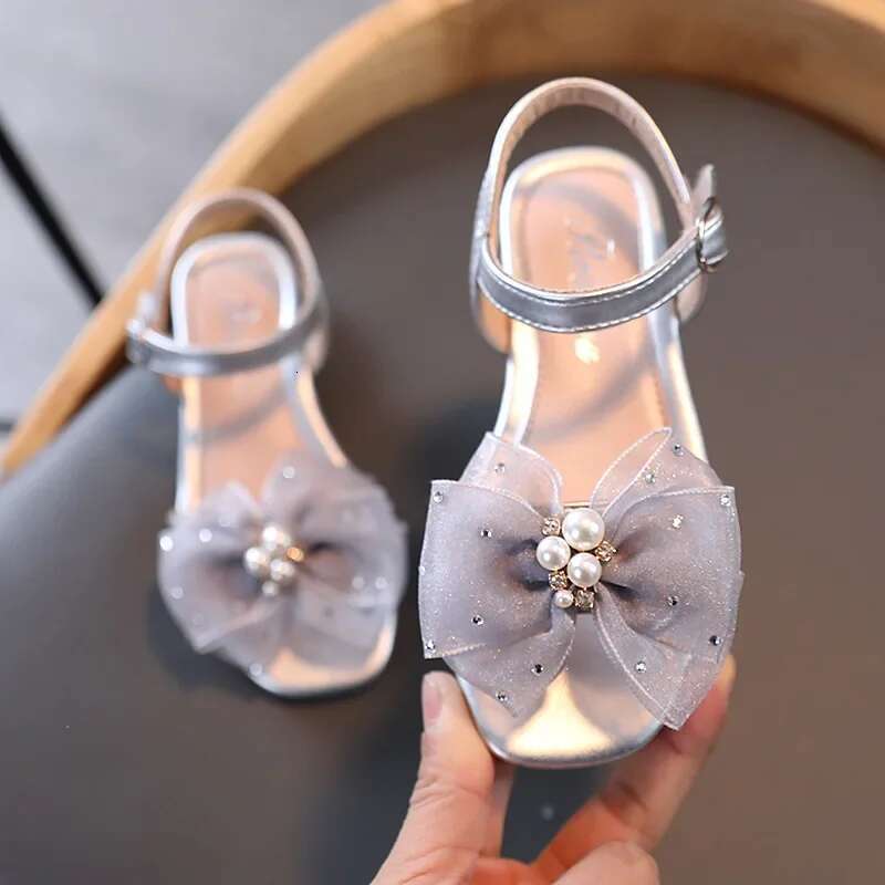 2025 Sandals Princess Shoes Korean Soft Bottom Baby Casual Bow Children's Shoes Girl Designer Fashion Women's Sandals