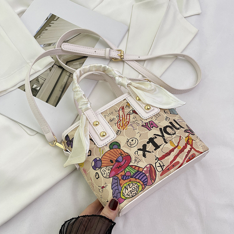 Free shipping small bag women's new painted graffiti fashion hand basket bag artistic texture crossbody bag