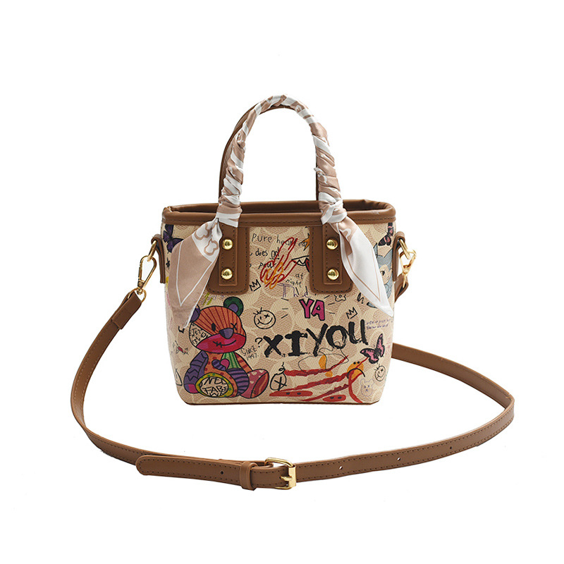 Free shipping small bag women's new painted graffiti fashion hand basket bag artistic texture crossbody bag