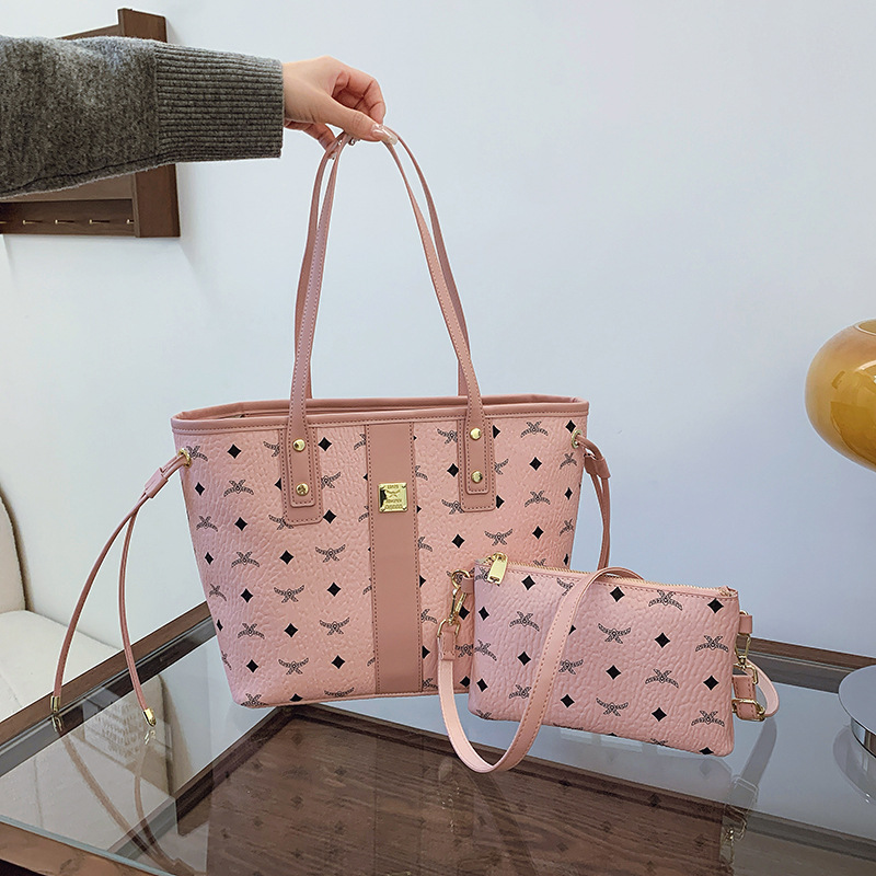The new fashion senior sense of temperament printed color women bag hand bill shoulder crossbody Tote bag 2025s hot