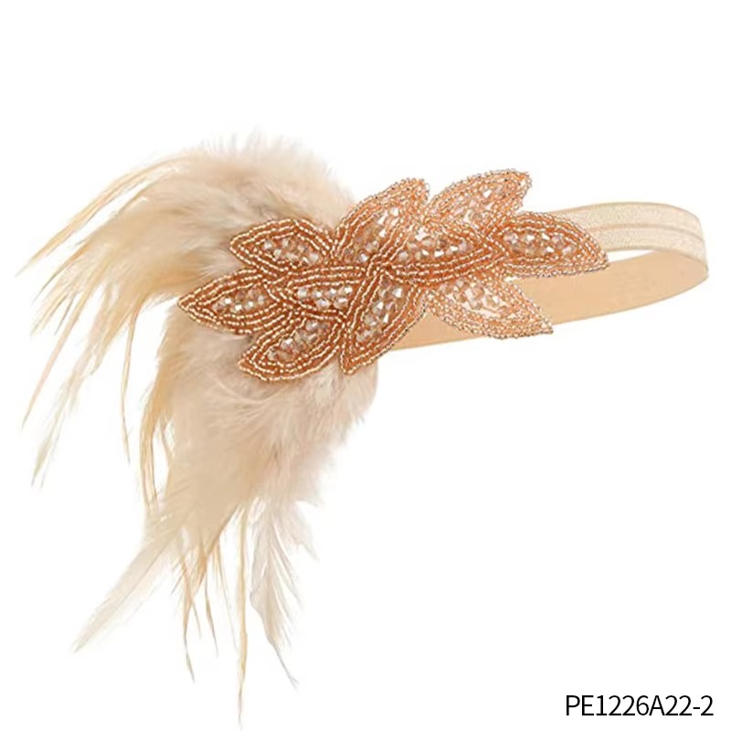 A collection of 4 apricot-colored 1920 women's costume accessories, headbands, necklaces, gloves, and teardrop earrings for Halloween character c