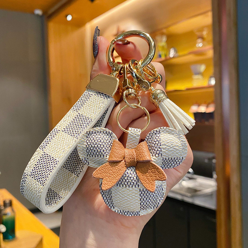 Free shipping designer keychains pendant cute ball cartoon otter rabbit fur exquisite classic leather plush keychain