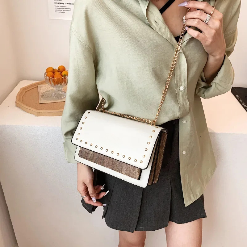 2025 new small square rivet decoration fashion chain messenger, a high-value designer multifunctional women's shoulder bag4