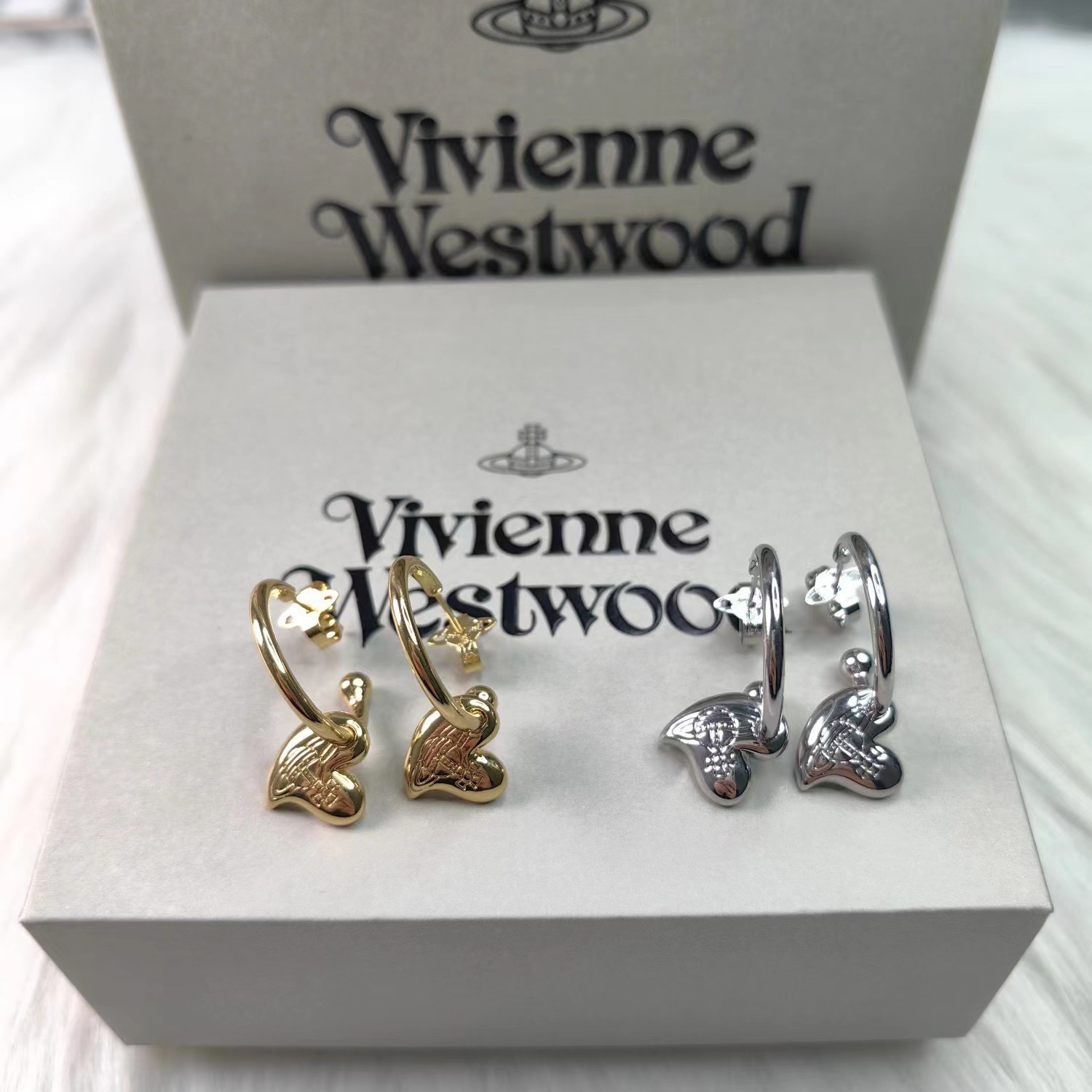 Designer Viviennen West Wood Saturn 23 New Western Empress Dowagers Oblique Love Saturn Earrings Female Simple and Elegant Planet Pendant Earrings High Edition