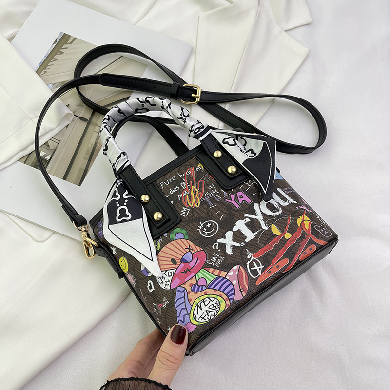Free shipping small bag women's new painted graffiti fashion hand basket bag artistic texture crossbody bag