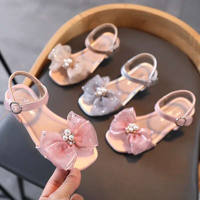 2025 Sandals Princess Shoes Korean Soft Bottom Baby Casual Bow Children's Shoes Girl Designer Fashion Women's Sandals