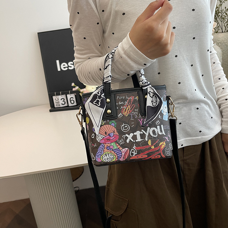 Free shipping small bag women's new painted graffiti fashion hand basket bag artistic texture crossbody bag 2025s hot
