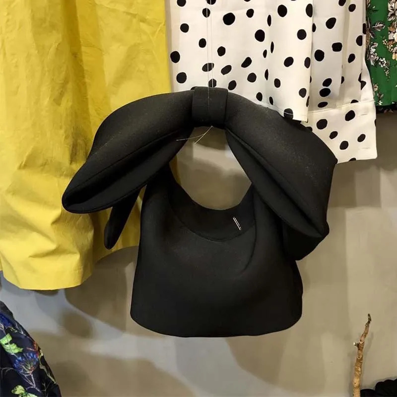 Home>Products>Shoulder bag>Makeup bag>Rib bag>Cute bow space cotton handbag 250402