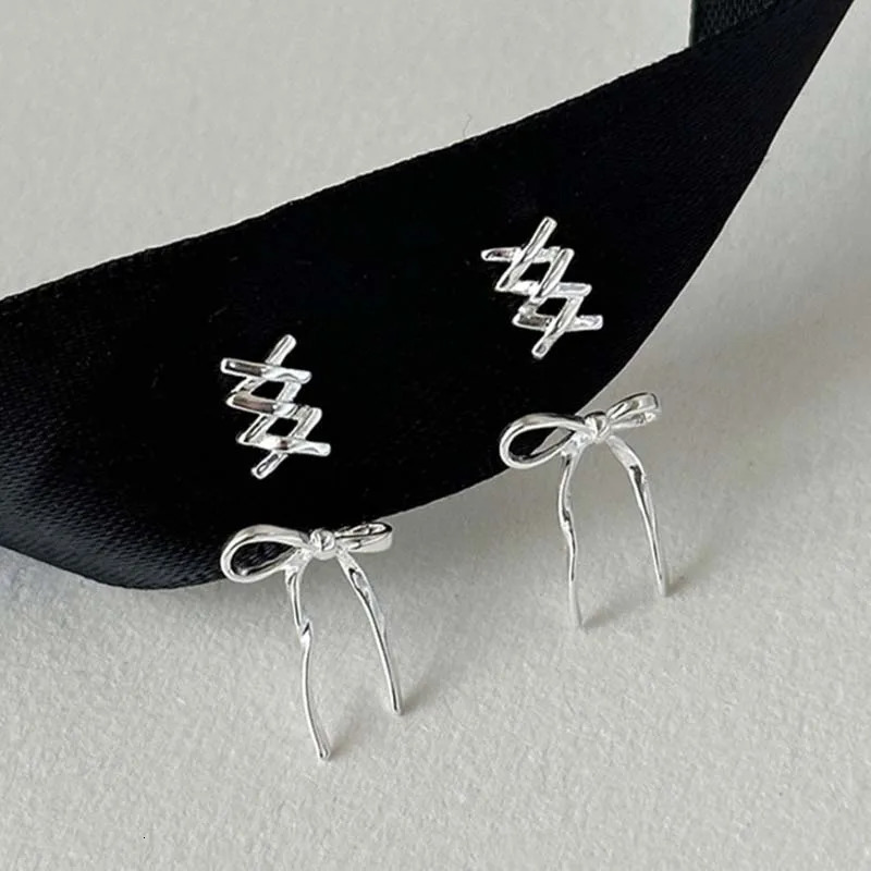 Silver Bow Female Stud Earrings 2024 Fashionable and Elegant Ribbon Pendant Party Jewelry Accessories 250326