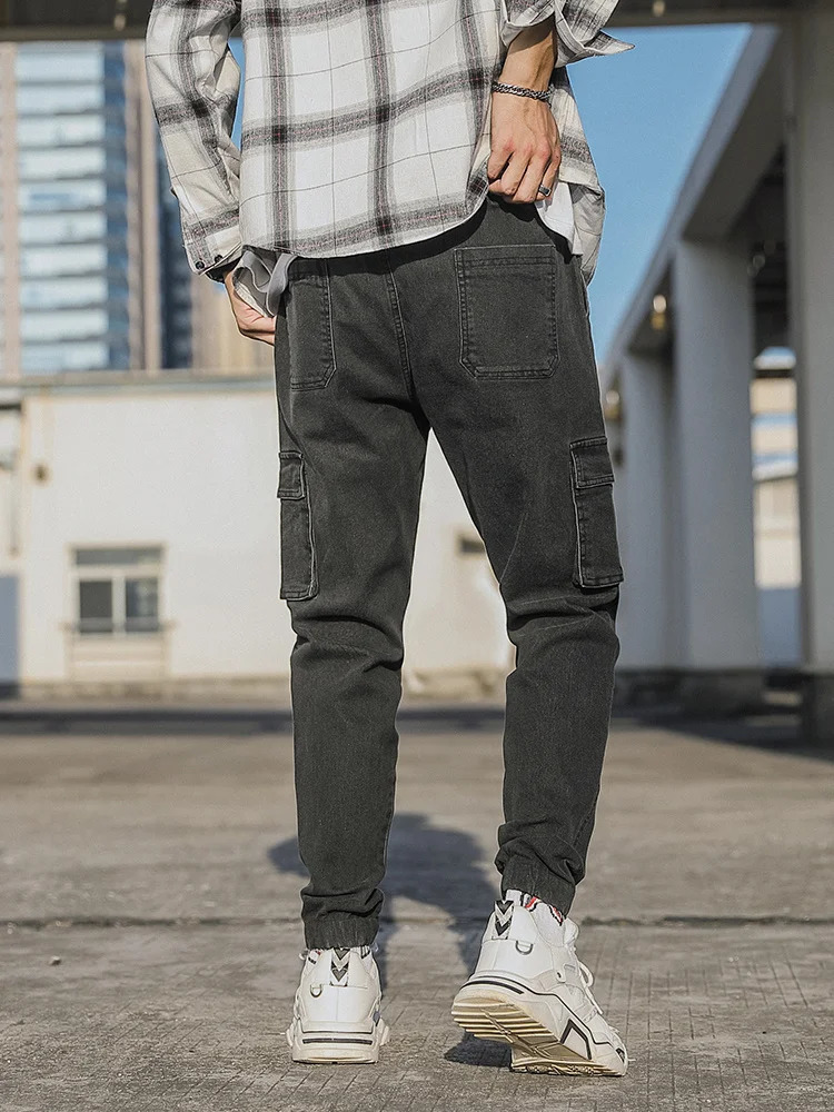 Spring and Autumn Mens Jeans Multi Pocket Work Clothes Cargo Pants Black and Blue Elastic Waist Denim Jogger Large Size Jeans Trousers 8XL 250402