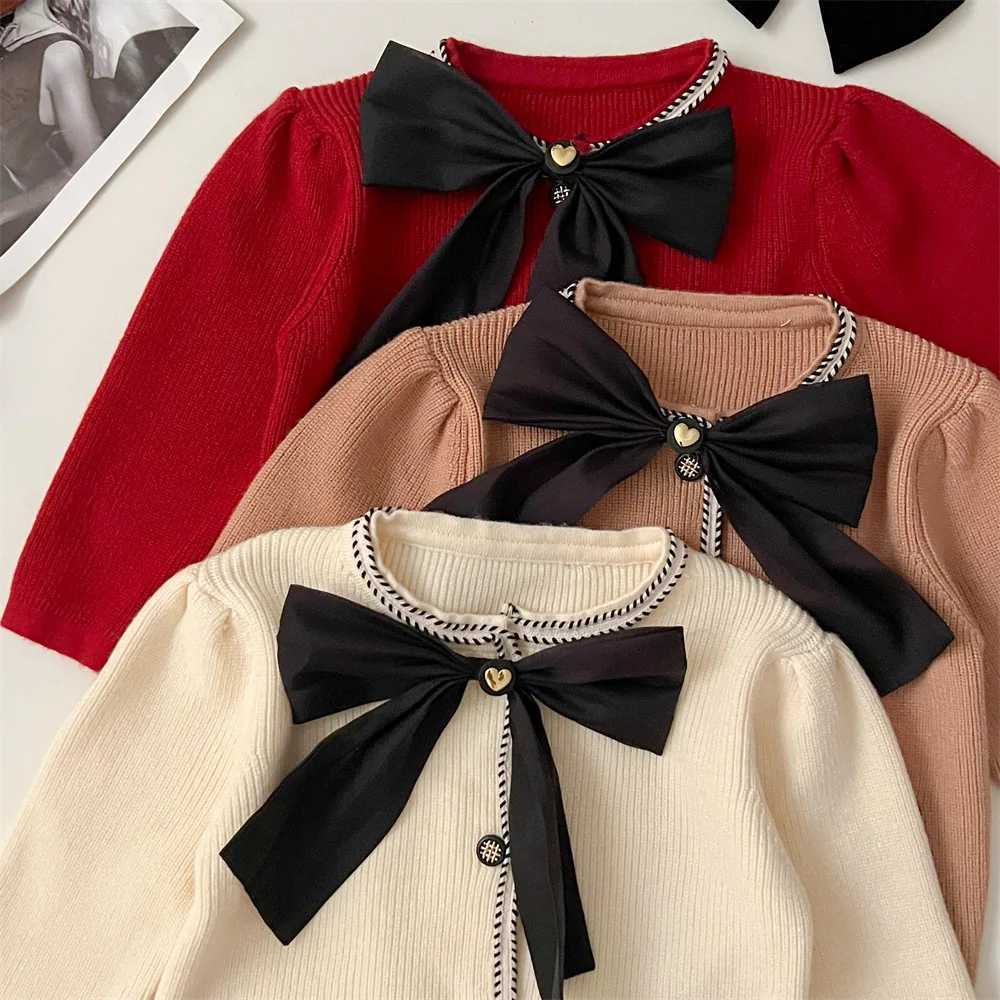 Autumn and Winter Girls Sweater Sets Campus Big Bow Knot Knitted Bubble Sleeve Cardigan Sweaterversatile Pleated Skirt 2pcs Y251105