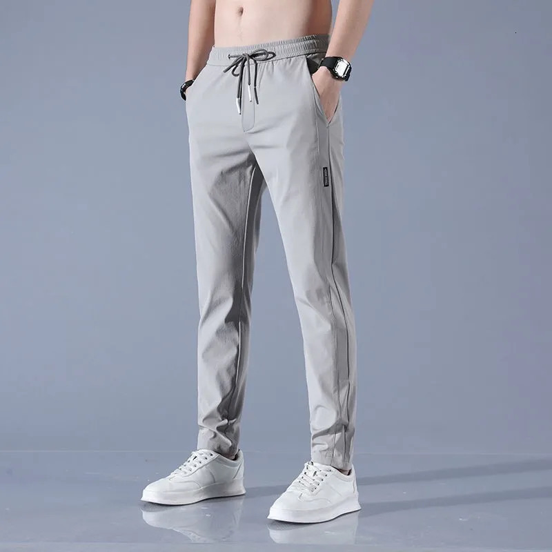 2025 summer slim Korean version plus size trendy straight tube light business ice silk casual pants for men slim fit pants 251104