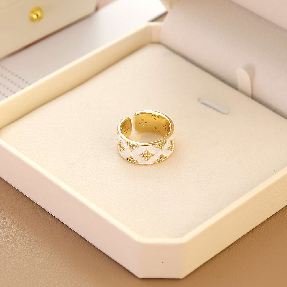 New White Enamel Four-Leaf Flower for Women, Niche Design, High-End Feel, Internet Celebrity Versatile Light Luxury Index Finger Ring Jewelry