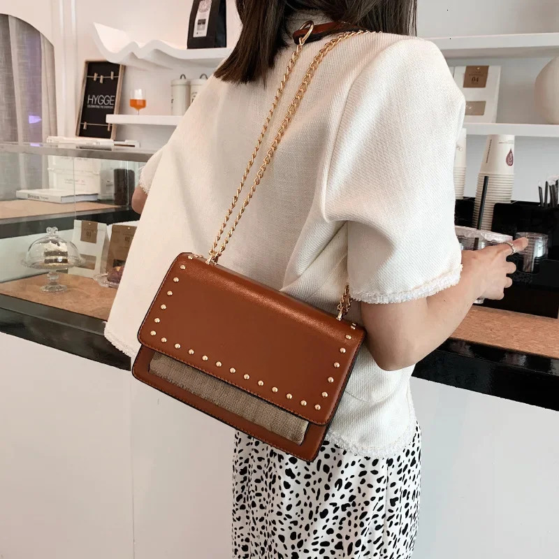 2025 new small square rivet decoration fashion chain messenger, a high-value designer multifunctional women's shoulder bag4