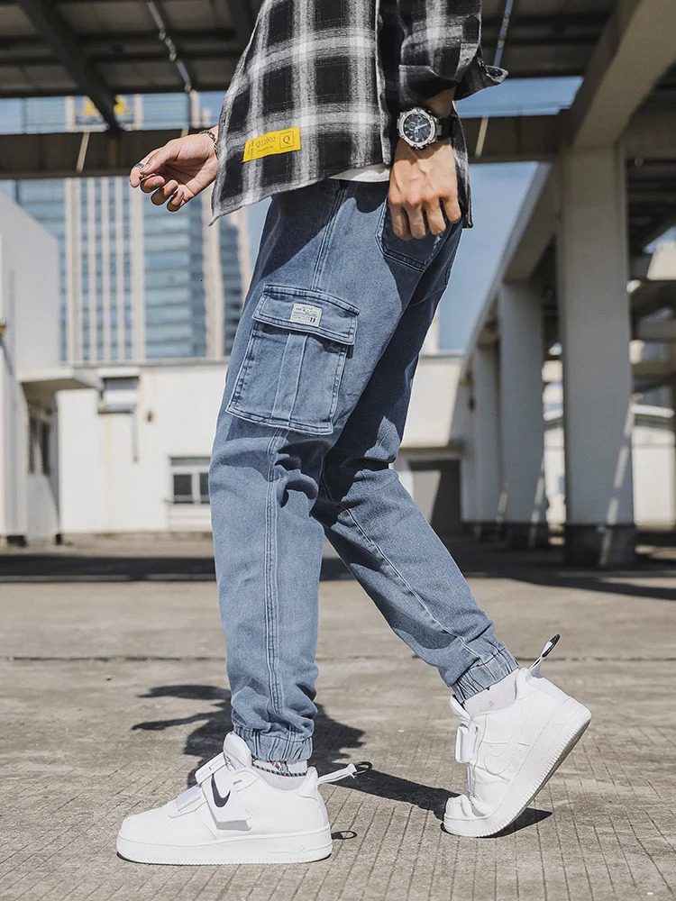 Spring and Autumn Mens Jeans Multi Pocket Work Clothes Cargo Pants Black and Blue Elastic Waist Denim Jogger Large Size Jeans Trousers 8XL 250402
