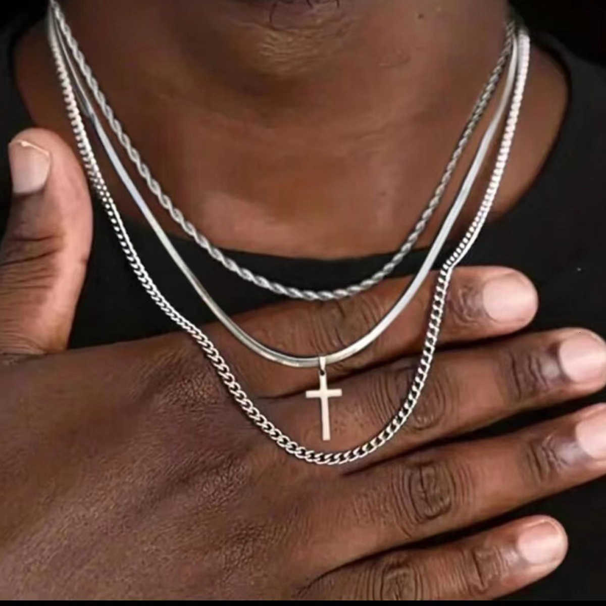 European and American best-selling 7-piece fashionable and simple stainless steel necklace and bracelet set. Smooth cross design.