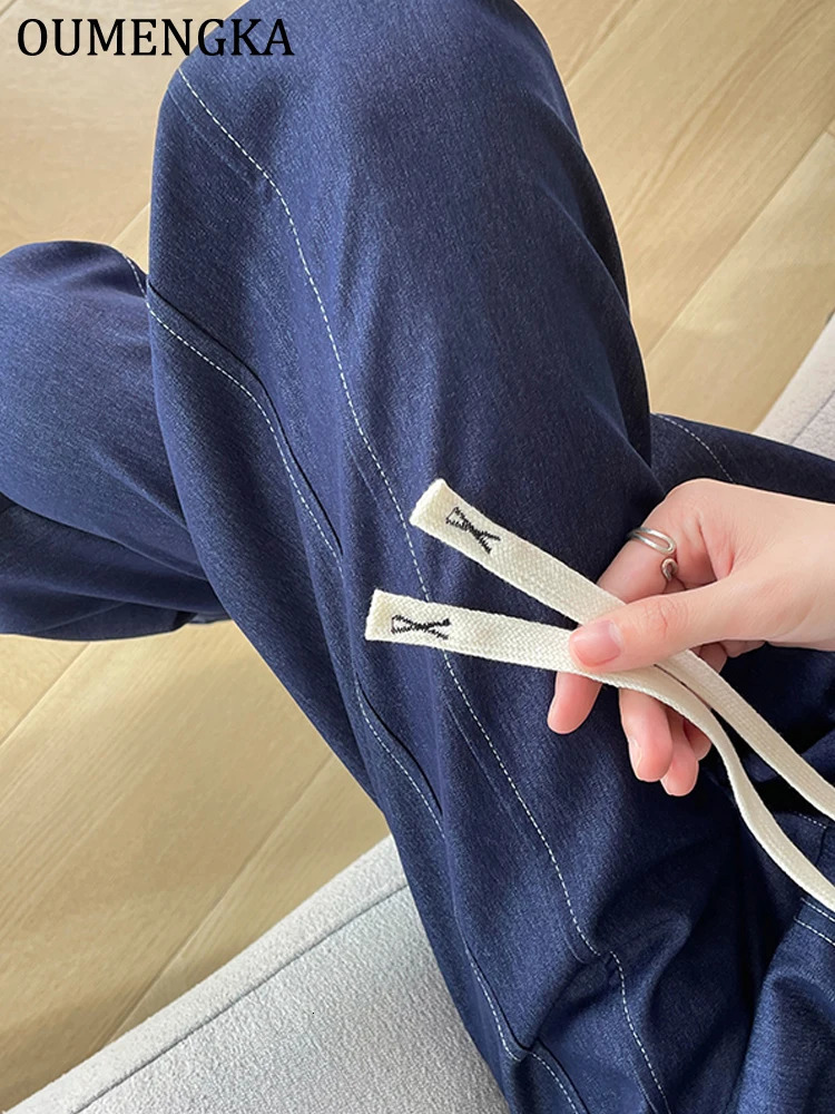 Oumenka highquality womens elastic band washed pants fashionable and sexy mens straight leg jeans 250403