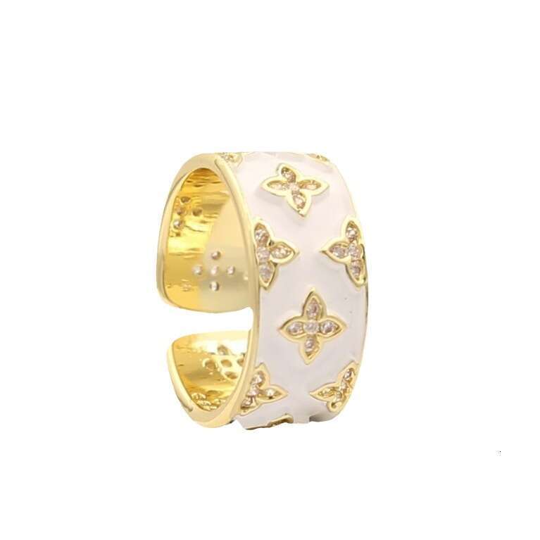 New White Enamel Four-Leaf Flower for Women, Niche Design, High-End Feel, Internet Celebrity Versatile Light Luxury Index Finger Ring Jewelry