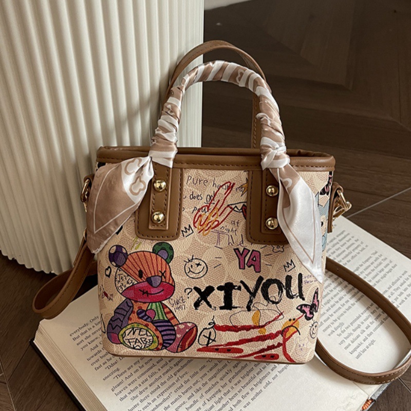 Free shipping small bag women's new painted graffiti fashion hand basket bag artistic texture crossbody bag 2025