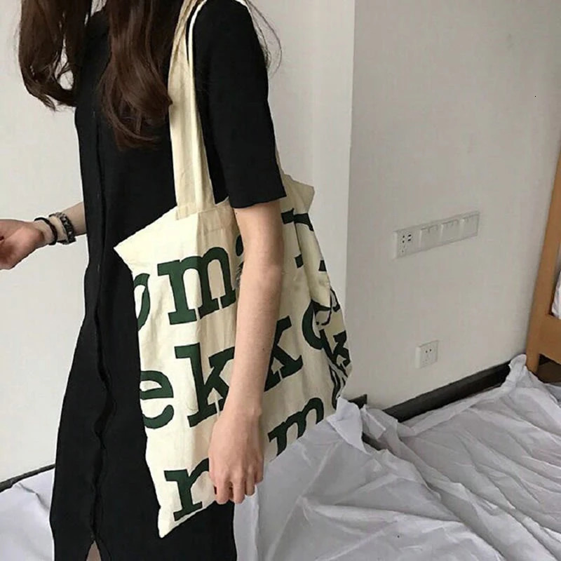 Womens casual large capacity shoulder bag shopping canvas letter fashion Harajuku zipper printed handbag 250401