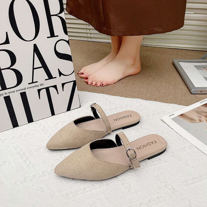 Slippers for women's outdoor wear 2025 new summer fashion versatile flat bottomed toe soft leather lazy person internet famous pointed half slipp