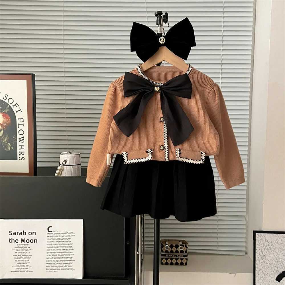 Autumn and Winter Girls Sweater Sets Campus Big Bow Knot Knitted Bubble Sleeve Cardigan Sweaterversatile Pleated Skirt 2pcs Y251105