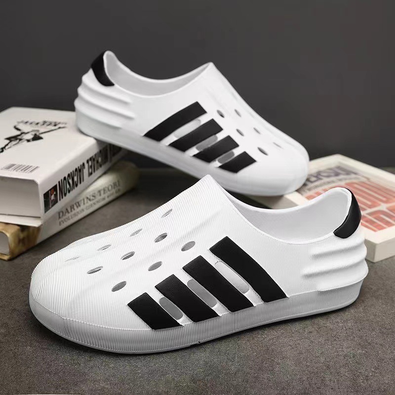 2025 spring and summer new slippers wear sports large size beach sandals unisex hollow breathable slippers black and white