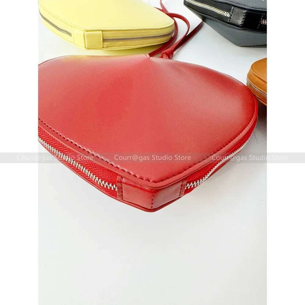 High-quality Cowhide Fashion Niche Design High-end Red Love Crossbody Armpit Bag
