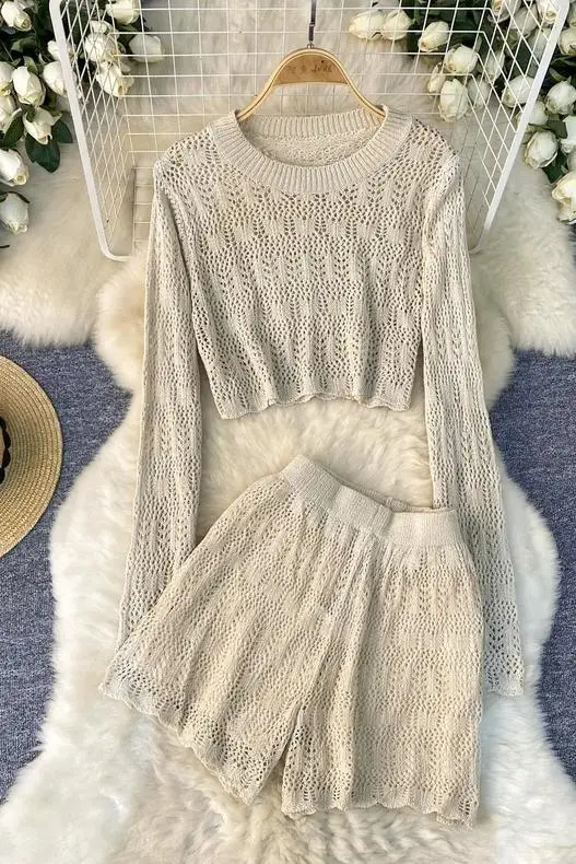Spring and summer two-piece solid color knitted suit womens round neck hollow short shirthigh waisted short shirt set 250401