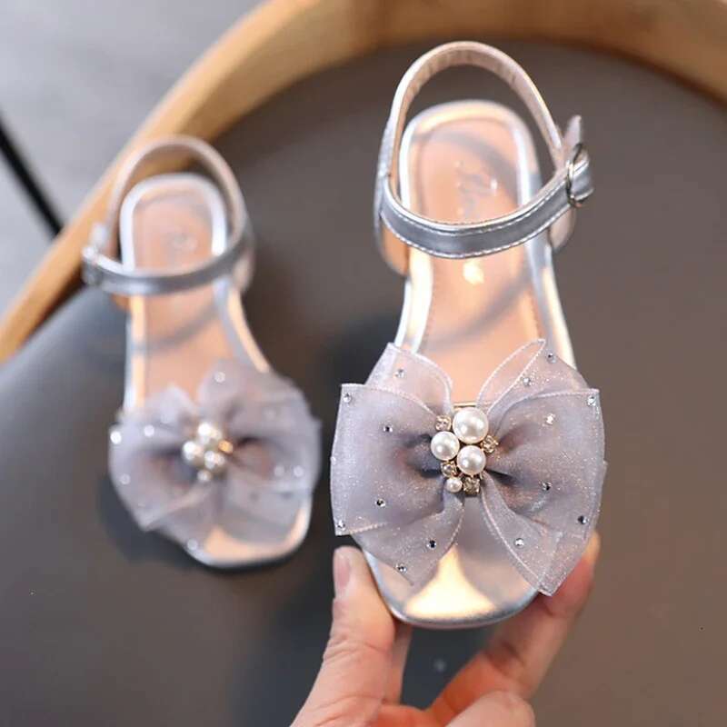2025 Sandals Princess Shoes Korean Soft Bottom Baby Casual Bow Children's Shoes Girl Designer Fashion Women's Sandals