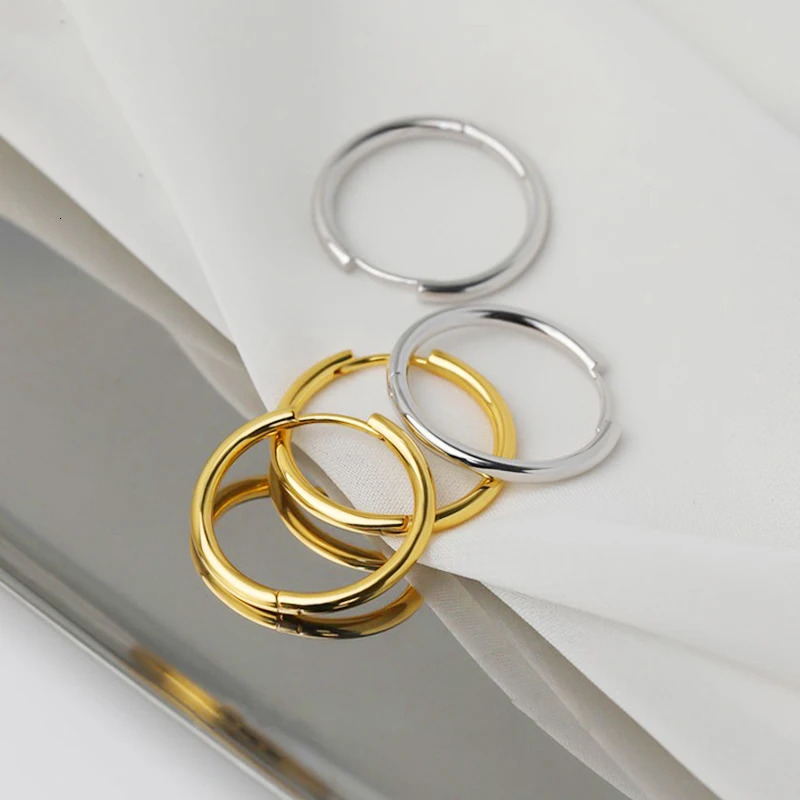 1 pair of multicolor neutral black gold stainless steel earrings suitable for women men punk gothic perforated jewelry 250326