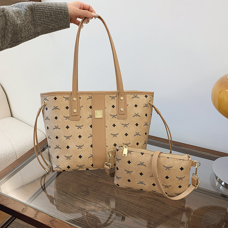 The new fashion senior sense of temperament printed color women bag hand bill shoulder crossbody Tote bag 2025s hot