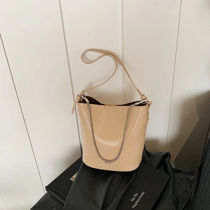 Product Chain Simple PU Bucket Womens Handbag Large Capacity Trendy Fashion Solid Color Trendy Buckle Shoulder Bag 251104