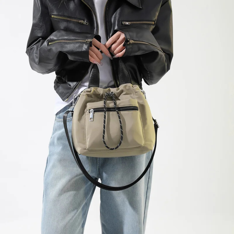 1 solid color womens shoulder bag Versatile handheld crossbody fashionable bucket can accommodate mobile phones 250401