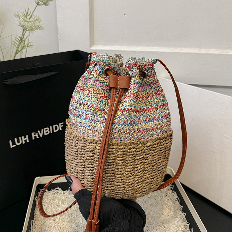 2025S Designer Women S Bag Instagram Bucket Women S Drawstring Single Shoulder Striped Woven Bag Vacation Beach Crossbody Handbag Large Bag
