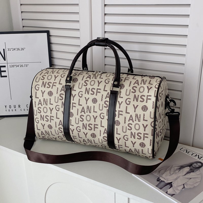 Spring new checked short-distance casual and fashionable large-capacity hand-held travel bag